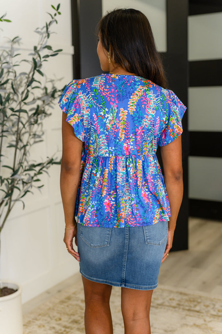 Flirt Alert Flutter Sleeve Top in Blue