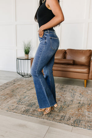 Layla High Rise Raw Hem Flare Jeans by Risen